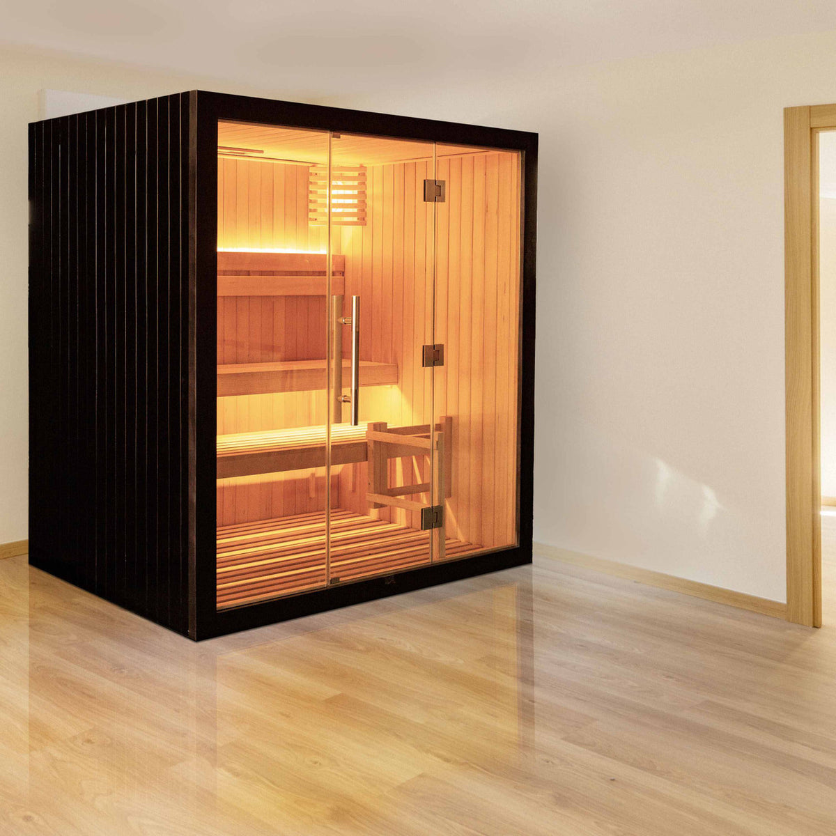 Aleko Canadian Hemlock Black Finish Traditional Indoor Sauna in an indoor setting.