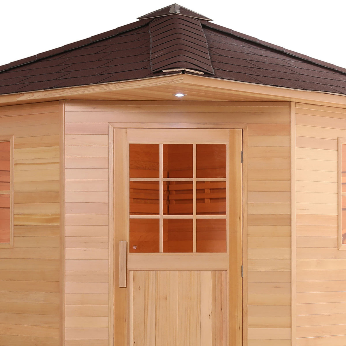 Close-up view of Aleko Canadian Hemlock Wet/Dry Outdoor Sauna Asphalt Roof 5 Person with 6 kW Electric Sauna Heater.