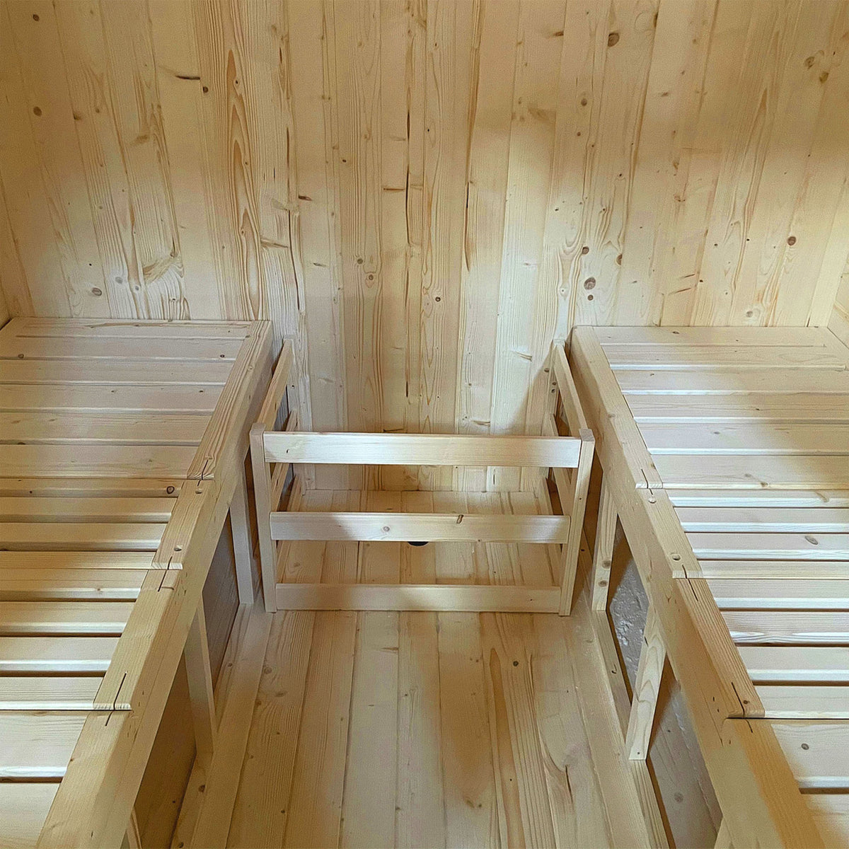 Lounging benches of Aleko Rustic Cedar Square Outdoor Sauna 4 Person with 4.5 kW Electric Sauna Heater in straight position.