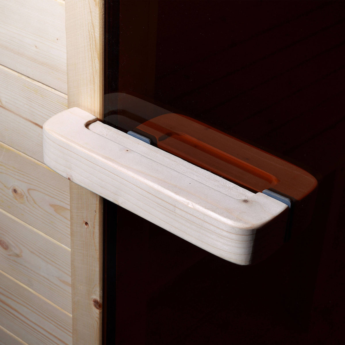 Door handle of Aleko White Finland Pine Wet/Dry 6/8 Person Outdoor Barrel Sauna with Front Porch Canopy and 8 kW Harvia KIP Electric Sauna Heater.