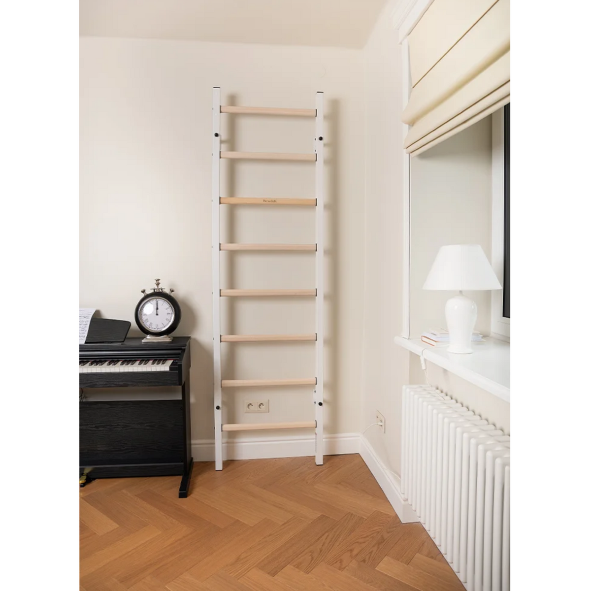 BenchK 200 Wall Bars and Gymnastic Ladders white version installed in a bedroom.