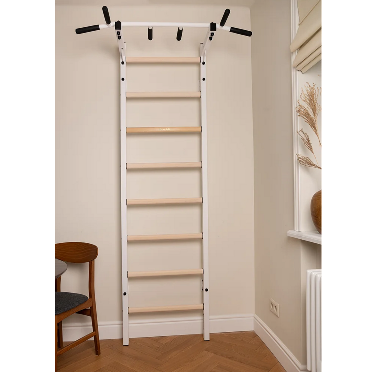 BenchK 221 Wall Bars and Gymnastic Ladders white version installed in a living room.