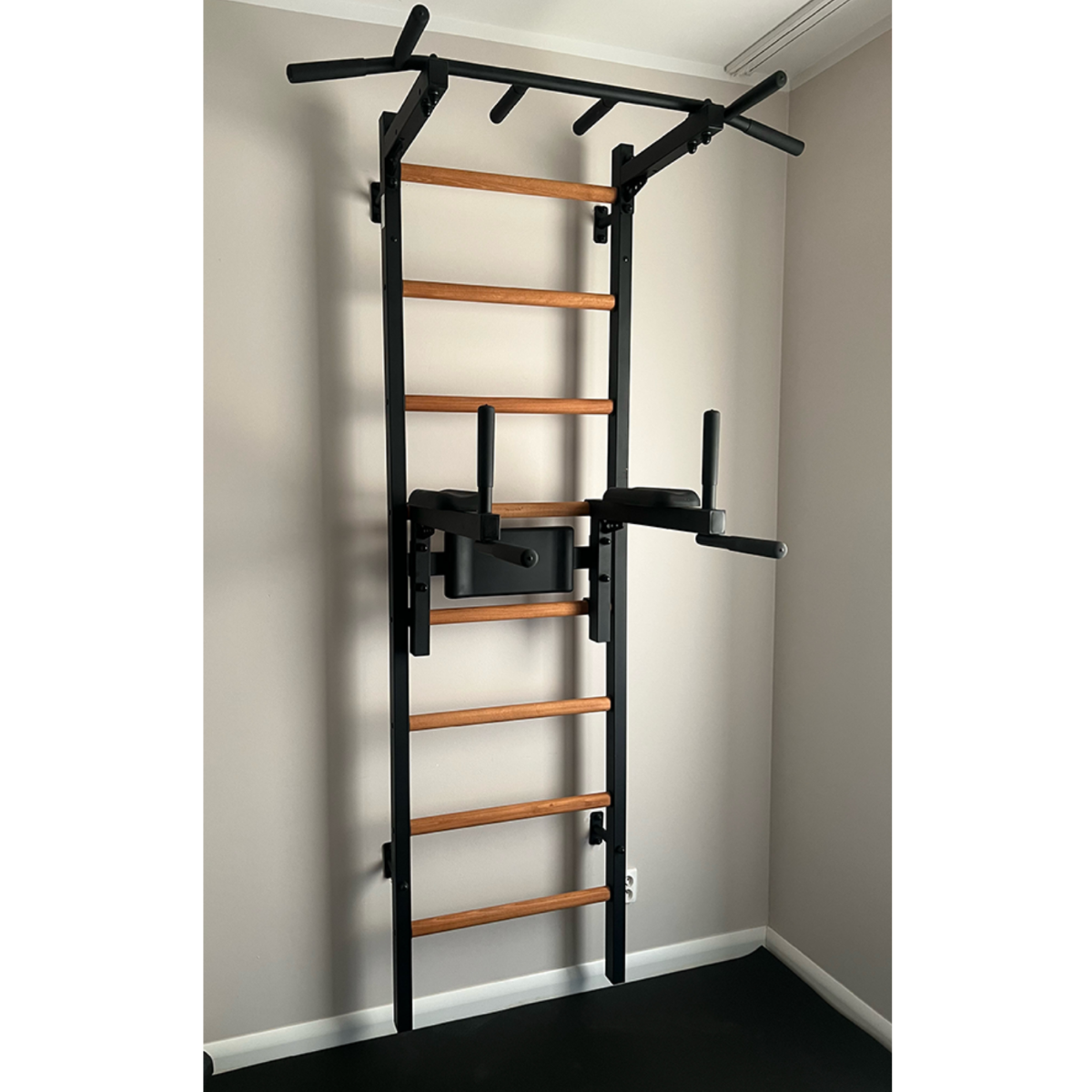 BenchK 222 Wall Bars and Gymnastic Ladders black version installed in a house.