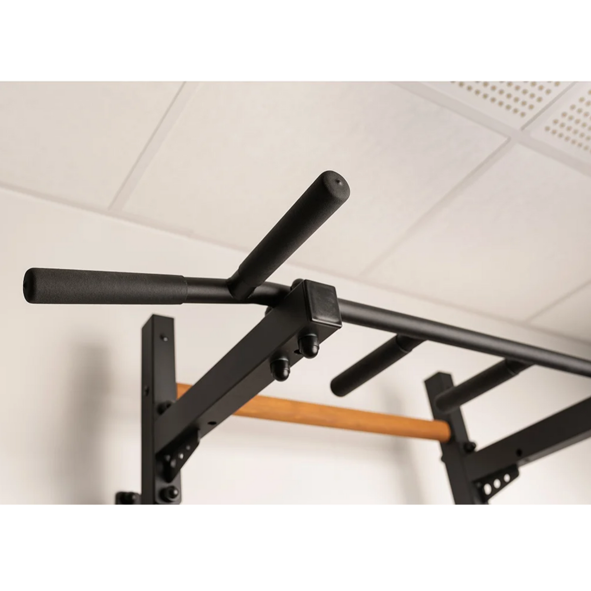 Close-up view of pull-up bar of BenchK 222 Wall Bars and Gymnastic Ladders black version.