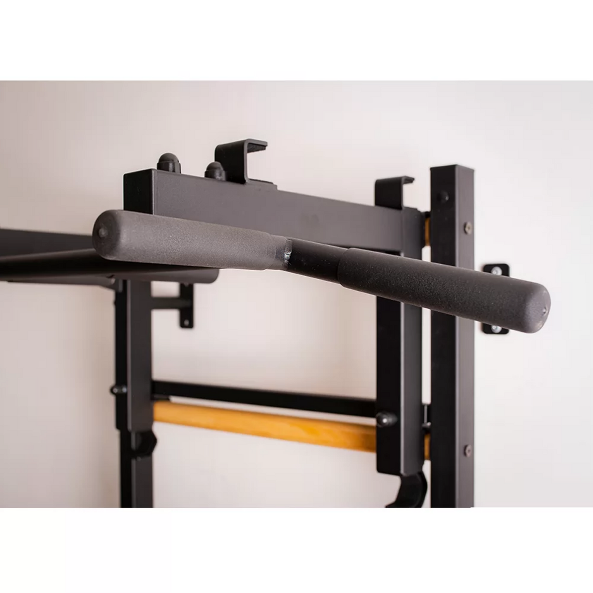 Close-up view of the pull-up bar of BenchK 231 Wall Bars &amp; Gymnastic Ladders black version.