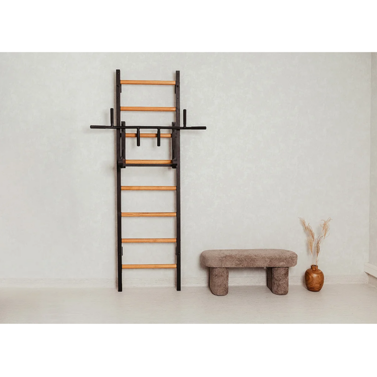 Front view of BenchK 231 Wall Bars &amp; Gymnastic Ladders in a living room.