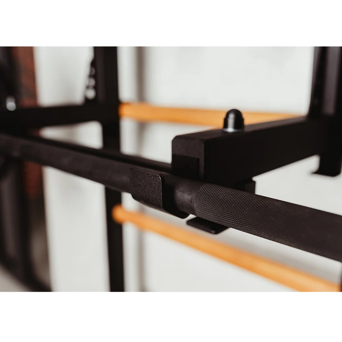 Close-up view of barbell holder of BenchK 232 Wall Bars &amp; Gymnastic Ladders black version.