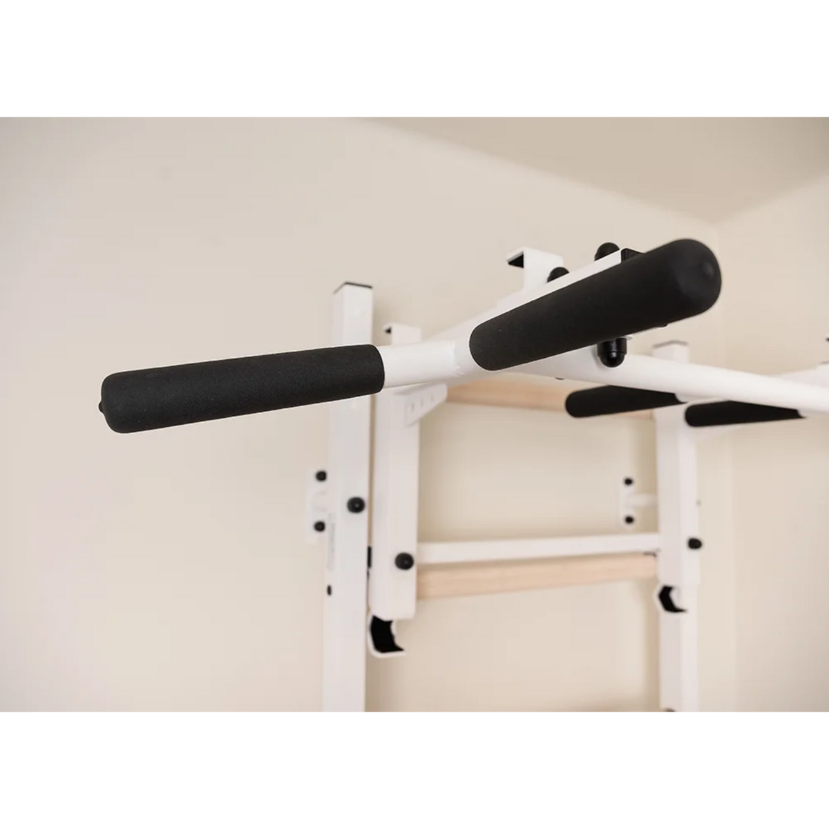 Close-up view of pull-up bar of BenchK 232 Wall Bars &amp; Gymnastic Ladders white version.