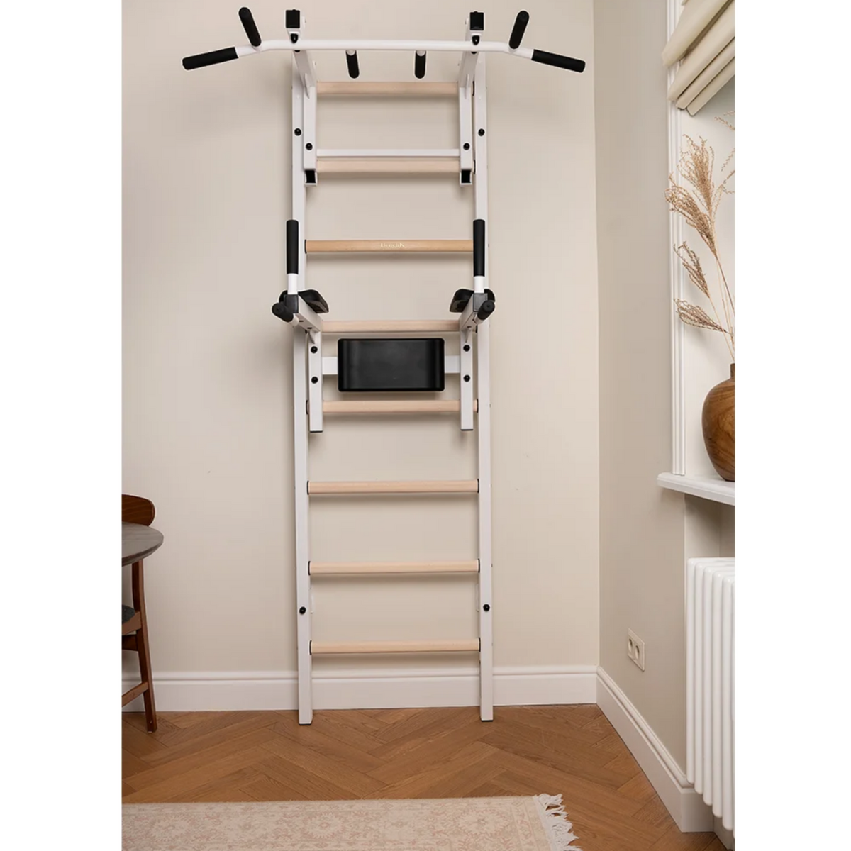 BenchK 232 Wall Bars &amp; Gymnastic Ladders white version in a living room.