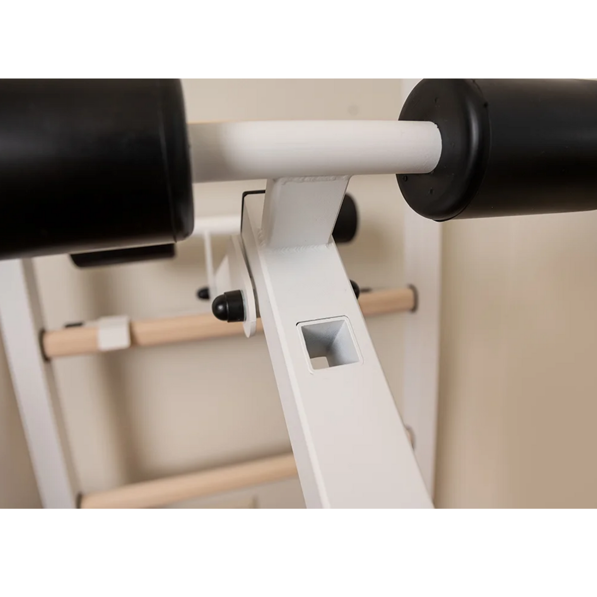 Close-up view of workout bench of BenchK 233 Wall Bars and Gymnastic Ladders white version.