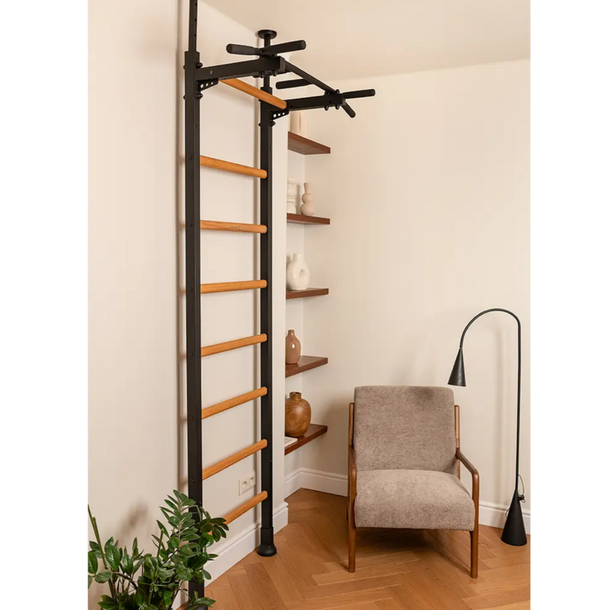 Side view of BenchK 521 Wall Bars and Gymnastic Ladders black version with pull-up bar installed in a living room.