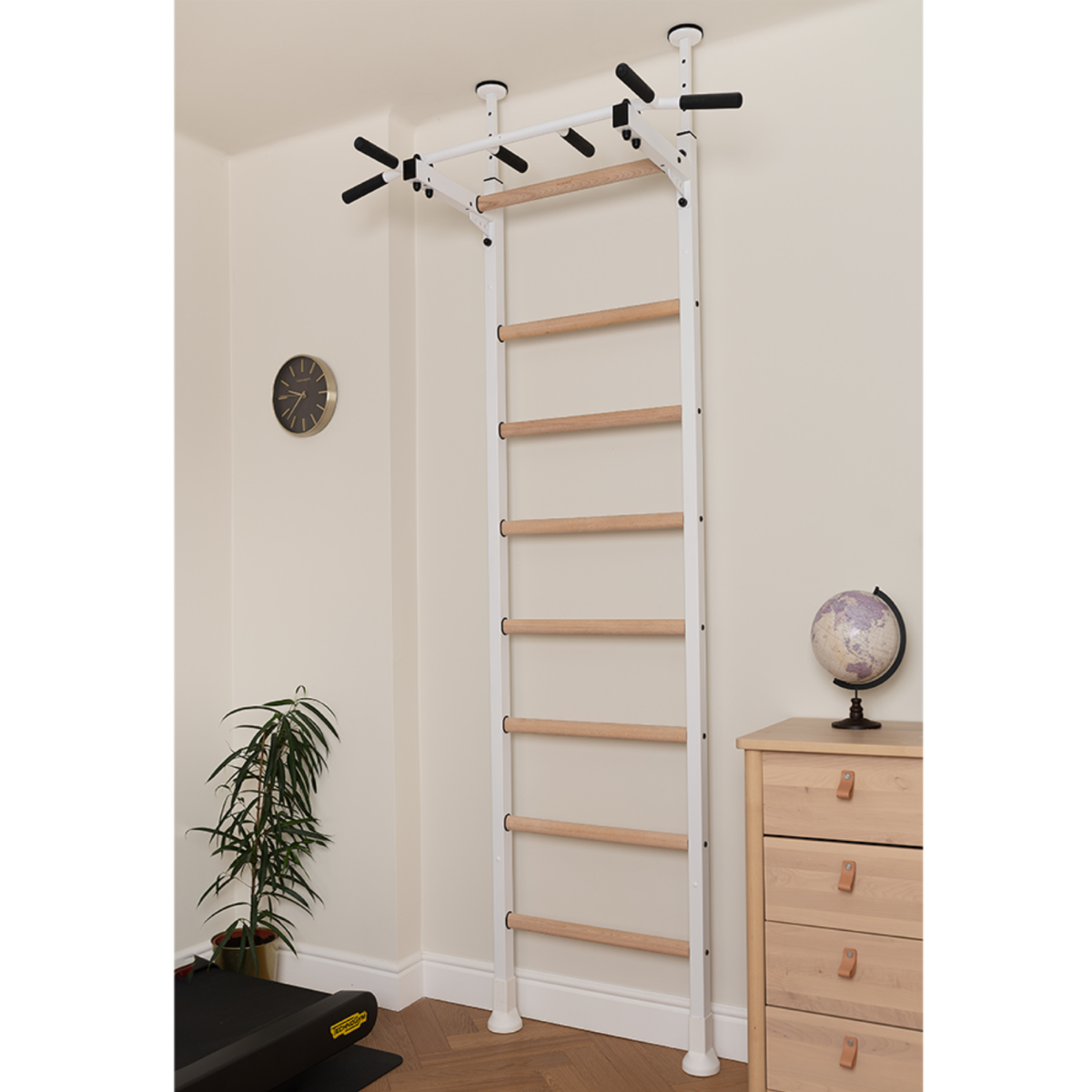 BenchK 521 Wall Bars and Gymnastic Ladders white version with pull-up bar installed in a home gym.