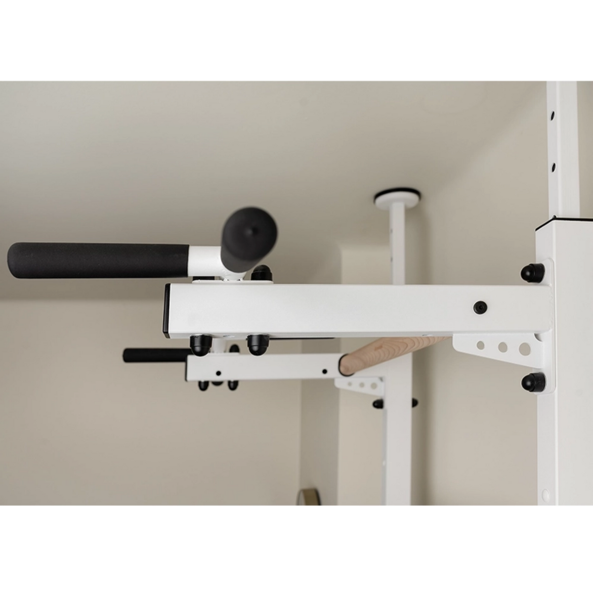 Pull-up bar side view of BenchK 521 Wall Bars and Gymnastic Ladders white version.