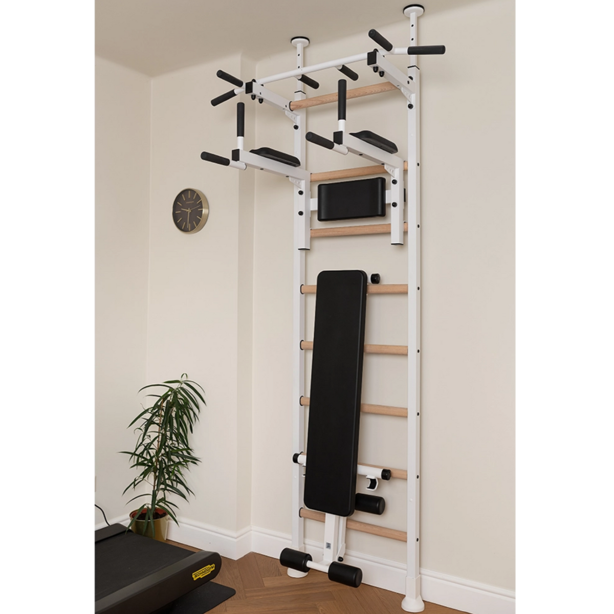 BenchK 523 Wall Bars and Gymnastic Ladders white version installed in a living room.