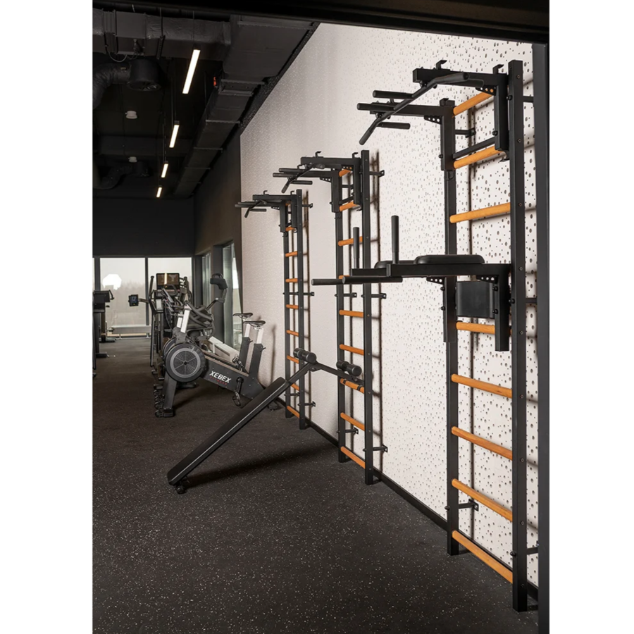 Set of three BenchK 732 Wall Bars and Gymnastic Ladders black version installed in a commercial gym.