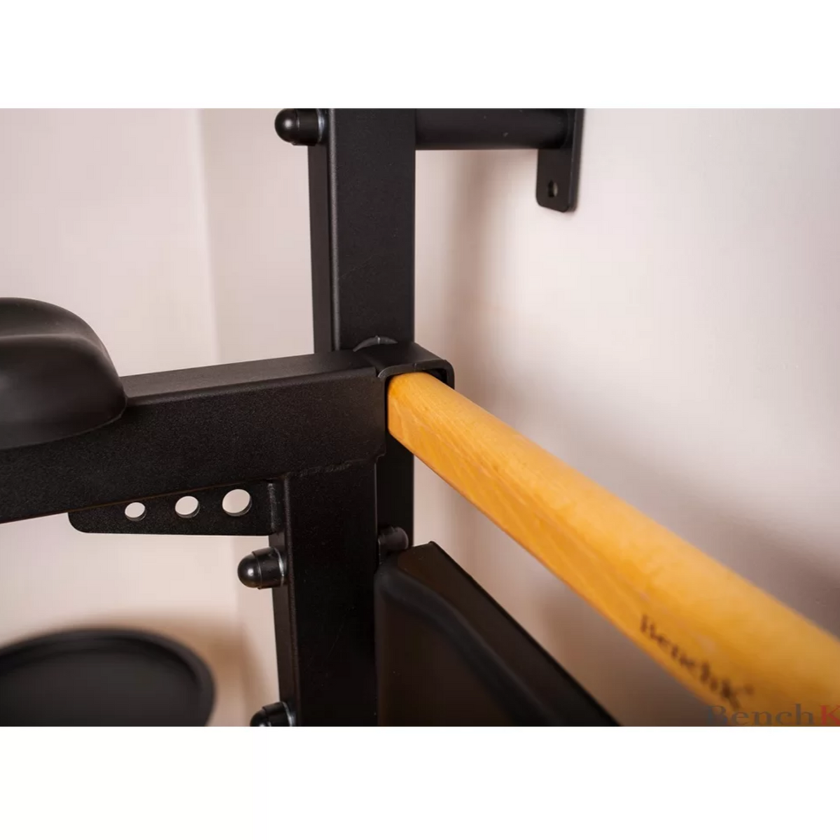 Close-up view of BenchK DB1 Dip Bar with back support and armrest black version.