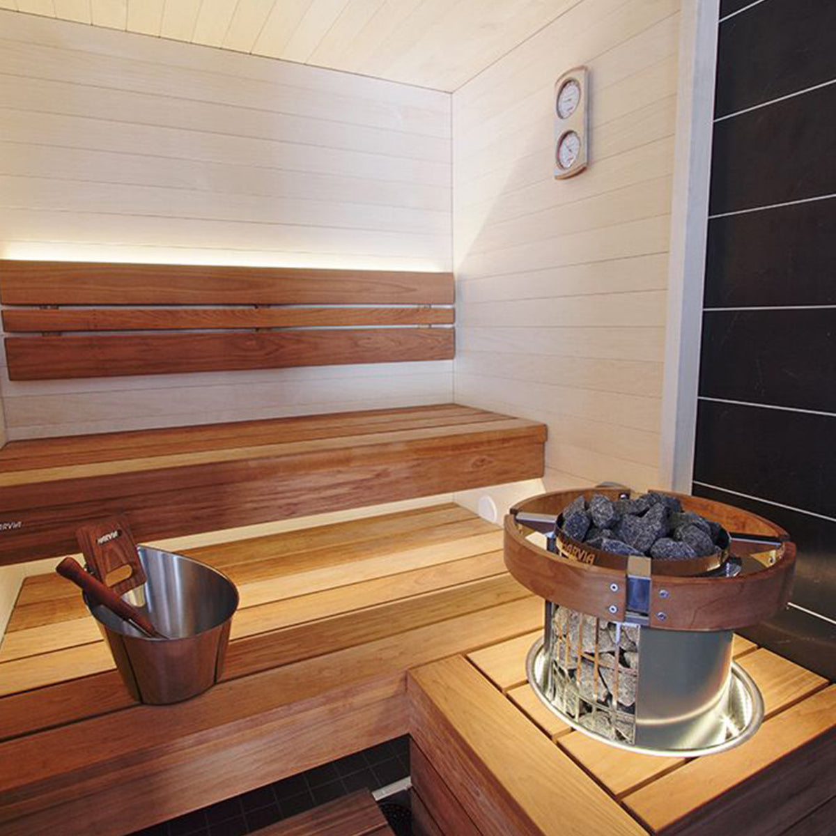 Harvia Cilindro Electric Sauna Heater in a wooden sauna room, showcasing its design.