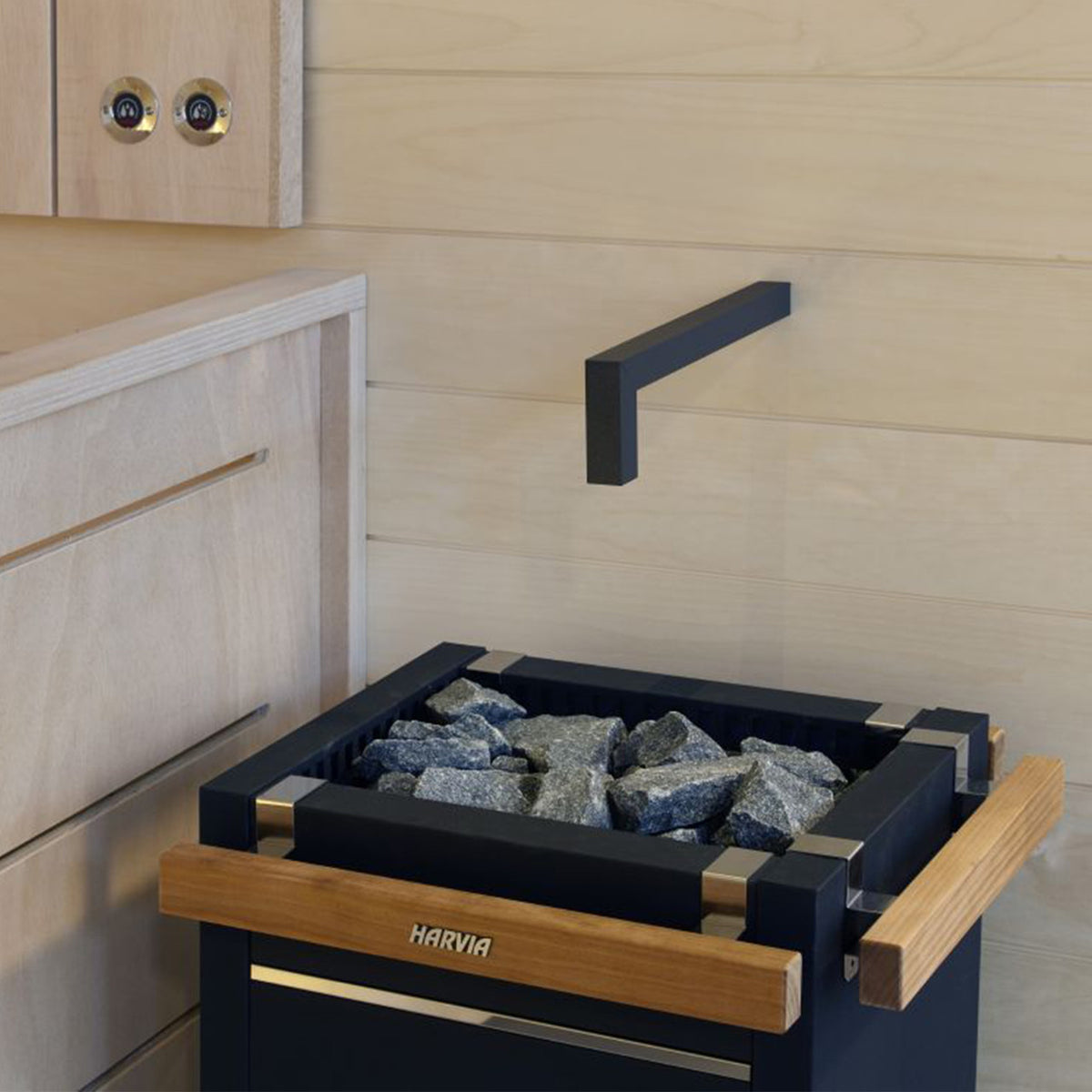 Close-up of Harvia Virta Electric Sauna Heater with WiFi Remote Control Panel and 10.5 kW power featuring sauna stones and wooden handle detail.