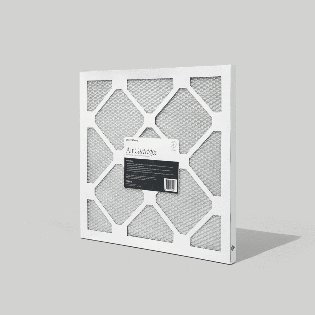 EnviroKlenz high-efficiency air filter cartridge against gray background, for trapping allergens and neutralizing chemicals.