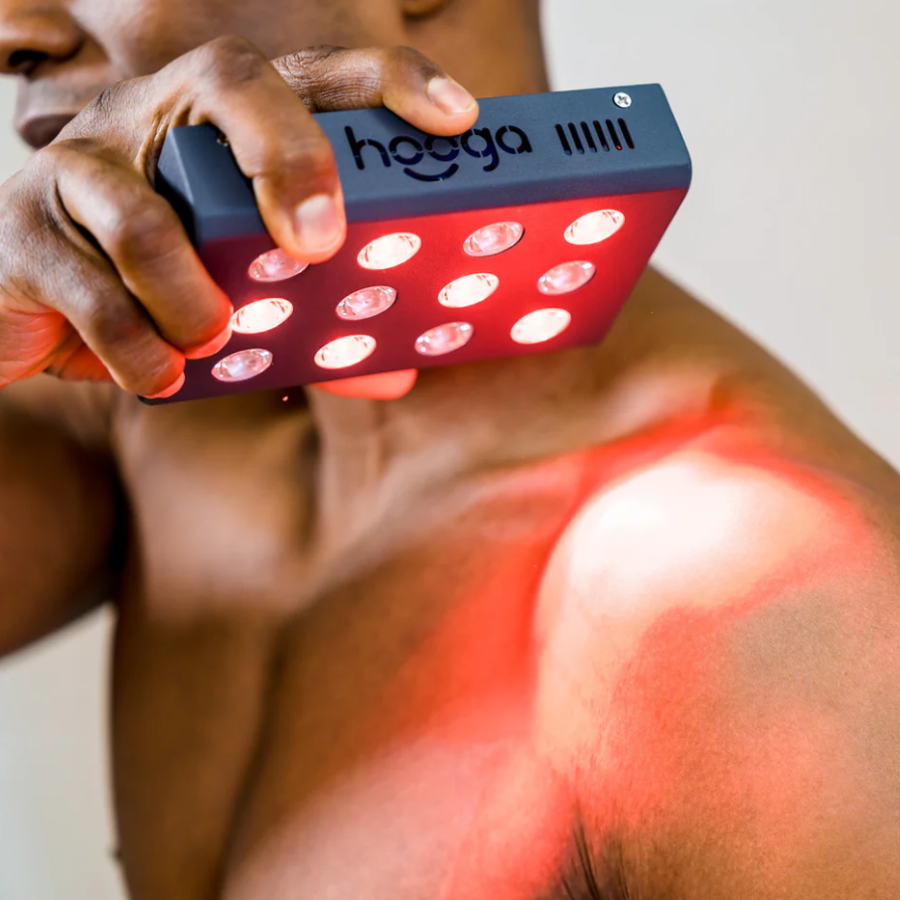 A man using a Hooga Red Light Therapy Charge.