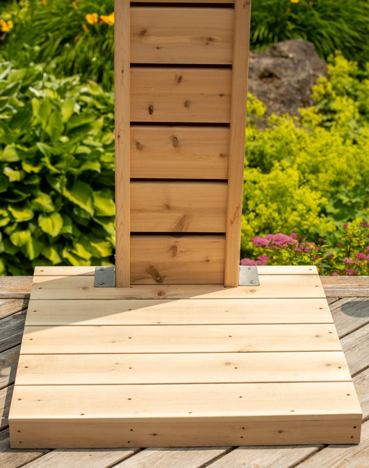 Close-up view of the floor of Leisurecraft Canadian Timber Sierra Outdoor Shower.