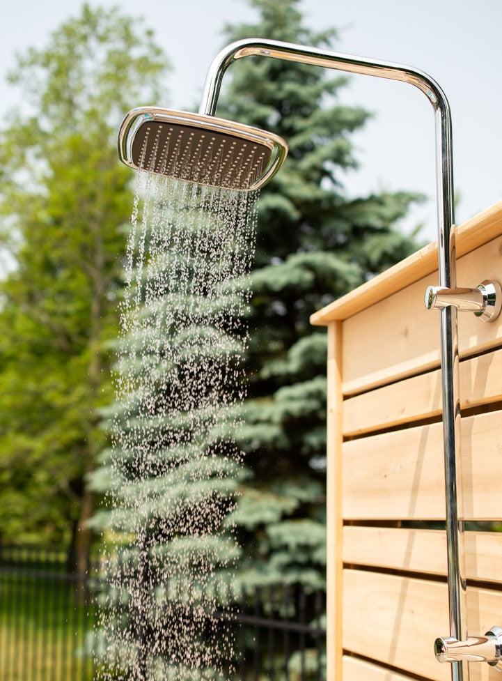 Shower head of Leisurecraft Canadian Timber Savannah Outdoor Shower in action.