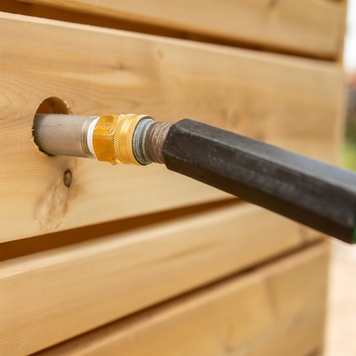 Close-up view of the water supply connection of Leisurecraft Canadian Timber Savannah Outdoor Shower.