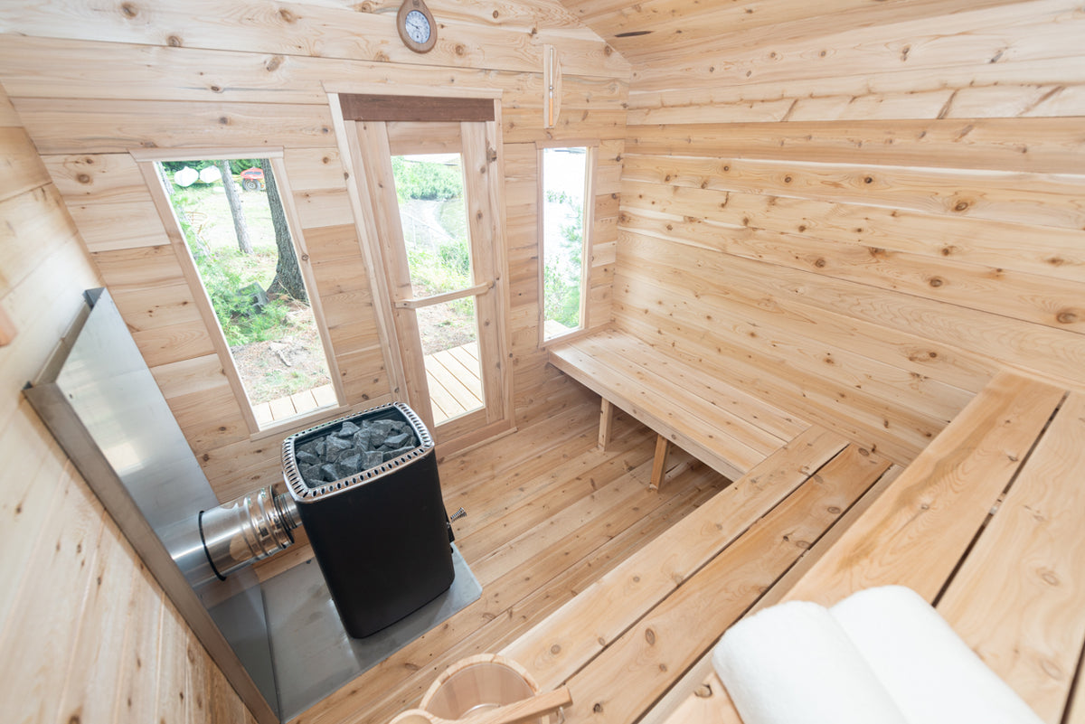 Interior view of Georgian Cabin Outdoor Sauna, showing its spacious and luminous design.