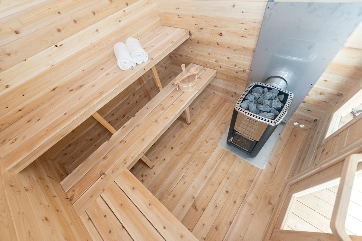 Interior view of  Leisurecraft Georgian Cabin Outdoor Sauna, with a focus on its elegant wooden floor.