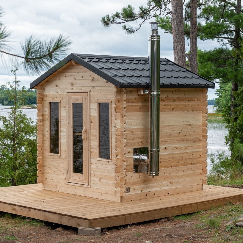 Main view of Leisurecraft Georgian Cabin Outdoor Sauna in a natural setting.  