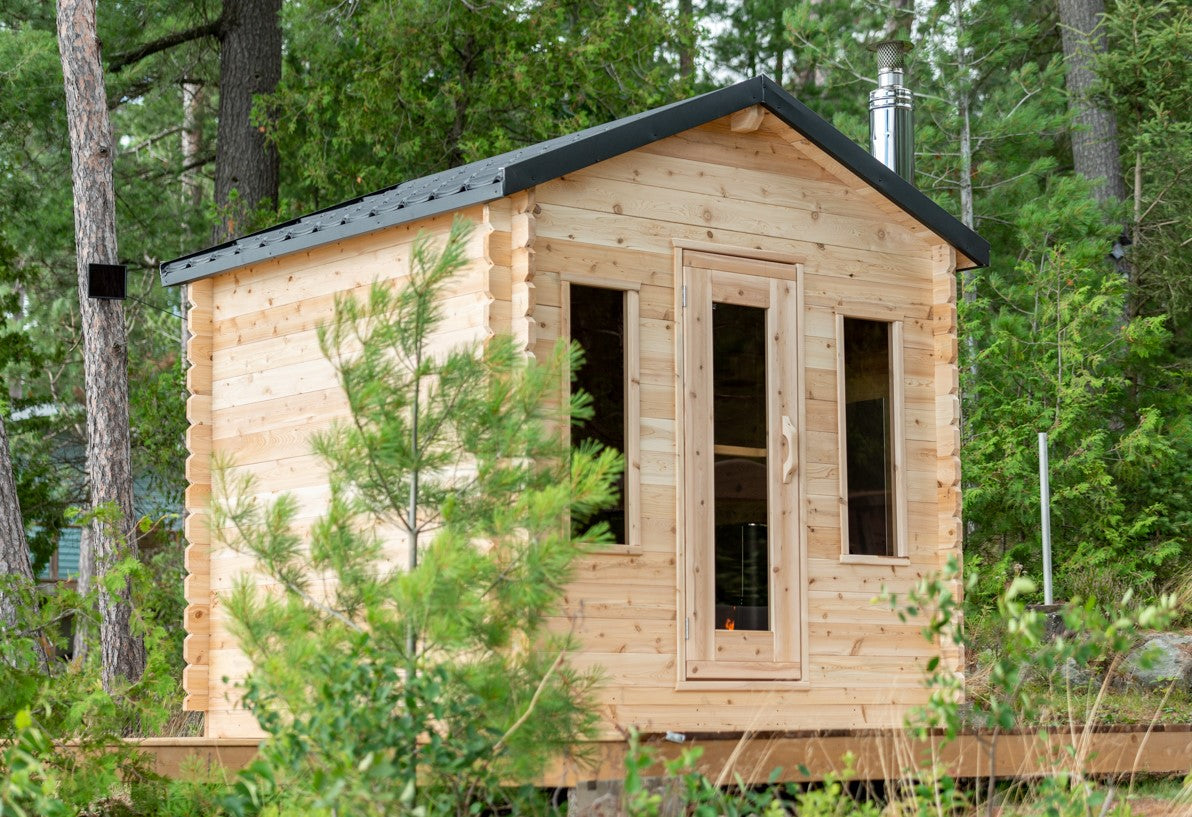 Georgian Cabin Outdoor Sauna in an outdoor setting surrounded by nature.