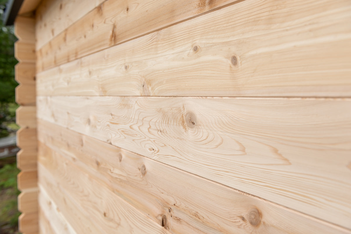 Close up view of the exterior wall of the  Leisurecraft Georgian Cabin Outdoor Sauna.