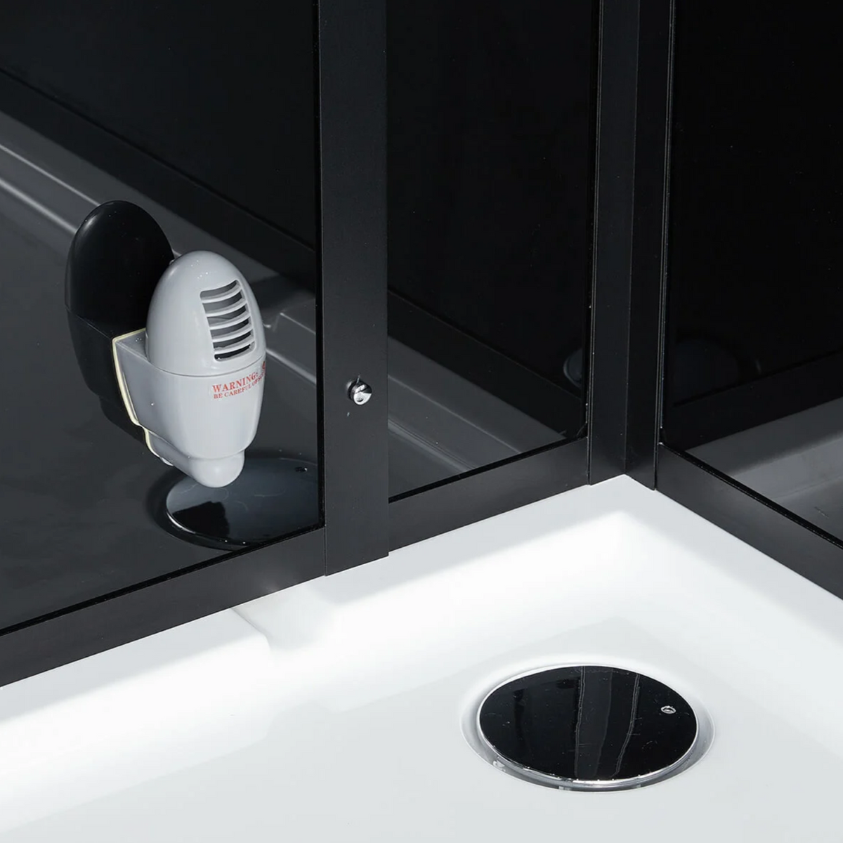 Close-up view of interior details of Maya Bath Anzio Steam Shower black version.