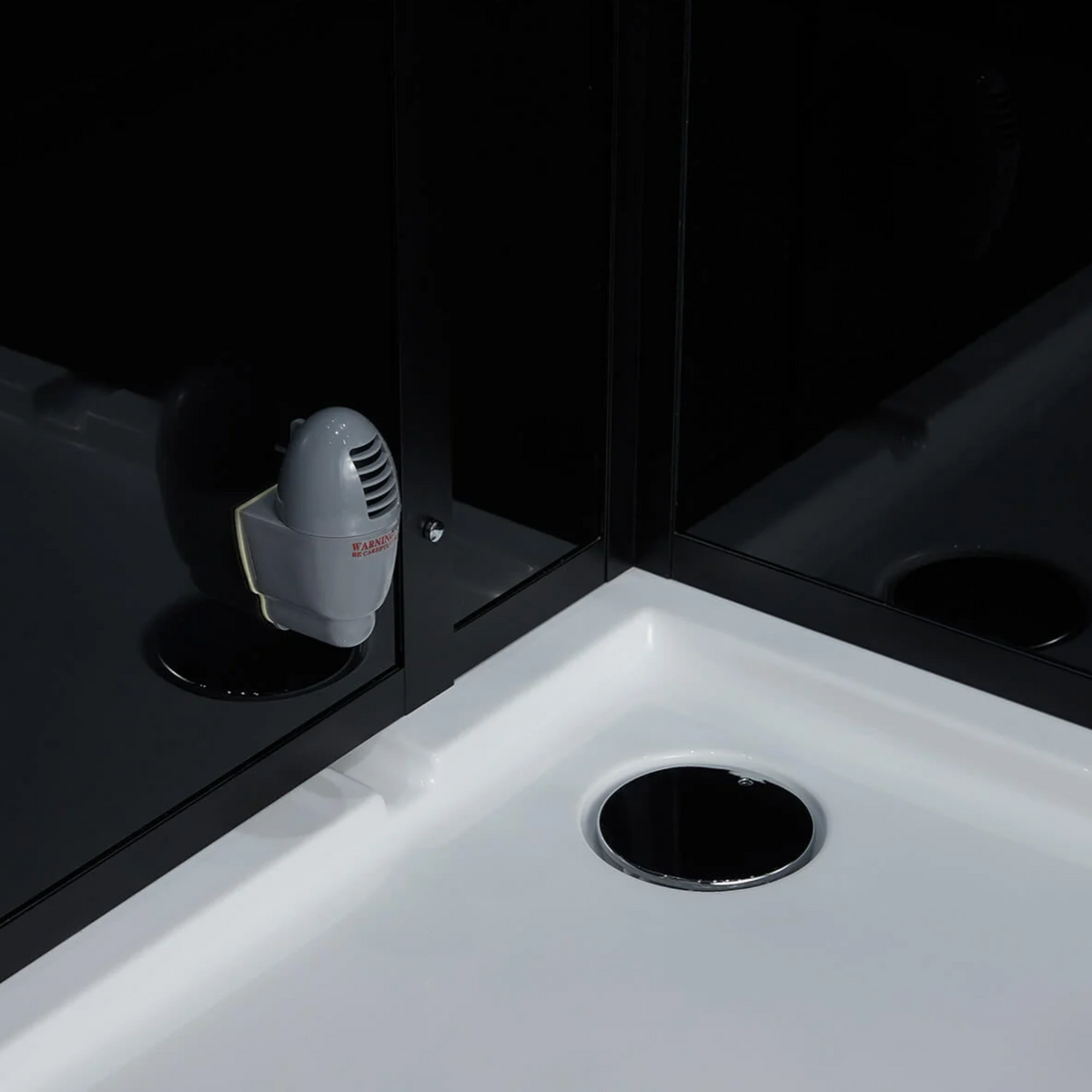 Drain of Maya Bath Platinum Arezzo Steam Shower black version.