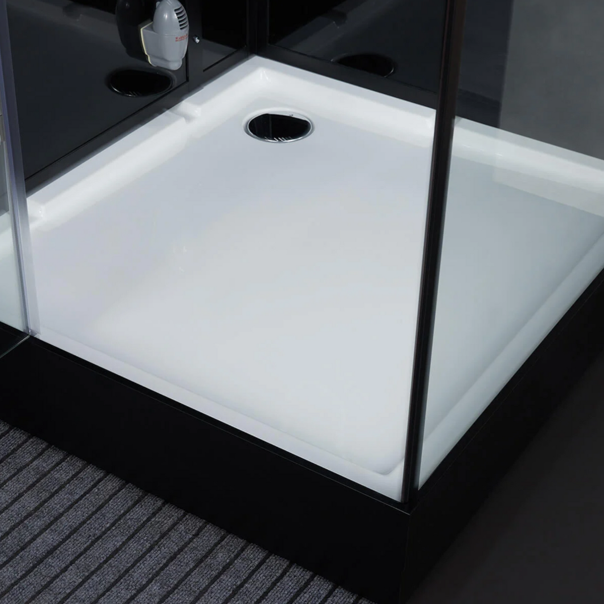 View of the floor of Maya Bath Platinum Arezzo Steam Shower black version.