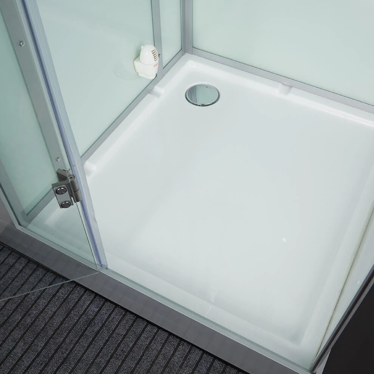 View of the floor of Maya Bath Platinum Arezzo Steam Shower white version.