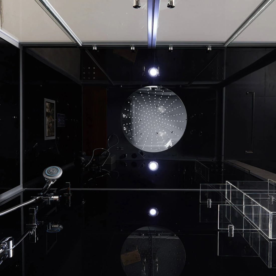 Close-up view of interior details of Maya Bath Platinum Catania Steam Shower black version.