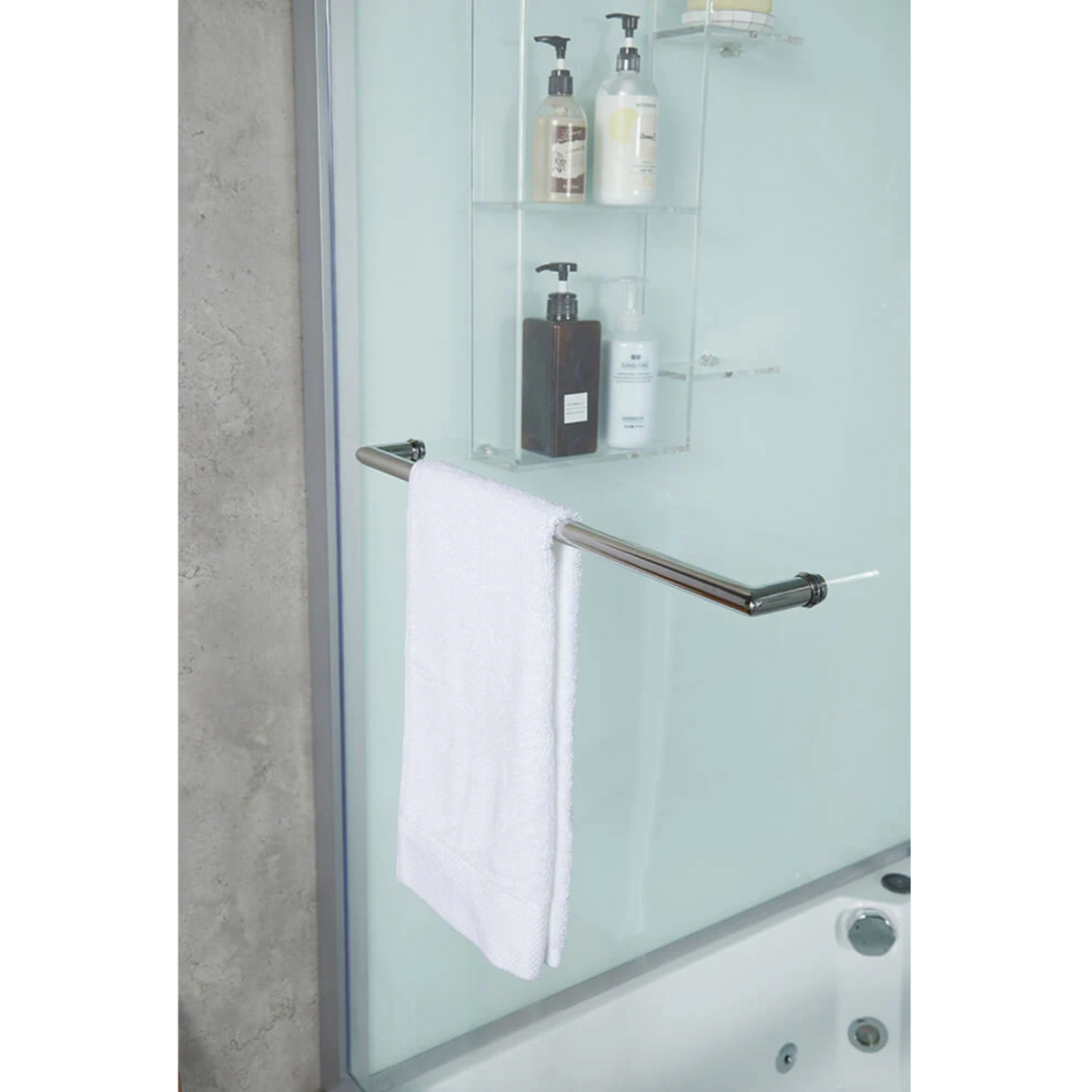 Interior view of Maya Bath Platinum Catania Steam Shower white version, showing the door, towel rack and shampoo racks. 