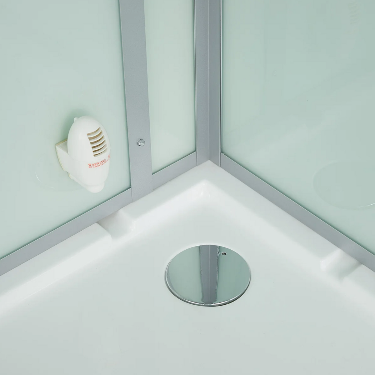 Close-up view of 5KW steam generator of Maya Bath Platinum Lucca Steam Shower white version.