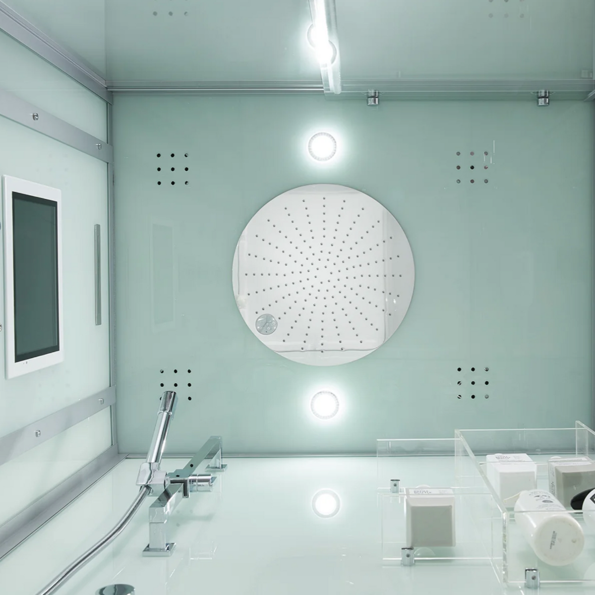 Interior view of Maya Bath Platinum Lucca Steam Shower white version, showing its rainfall shower head.