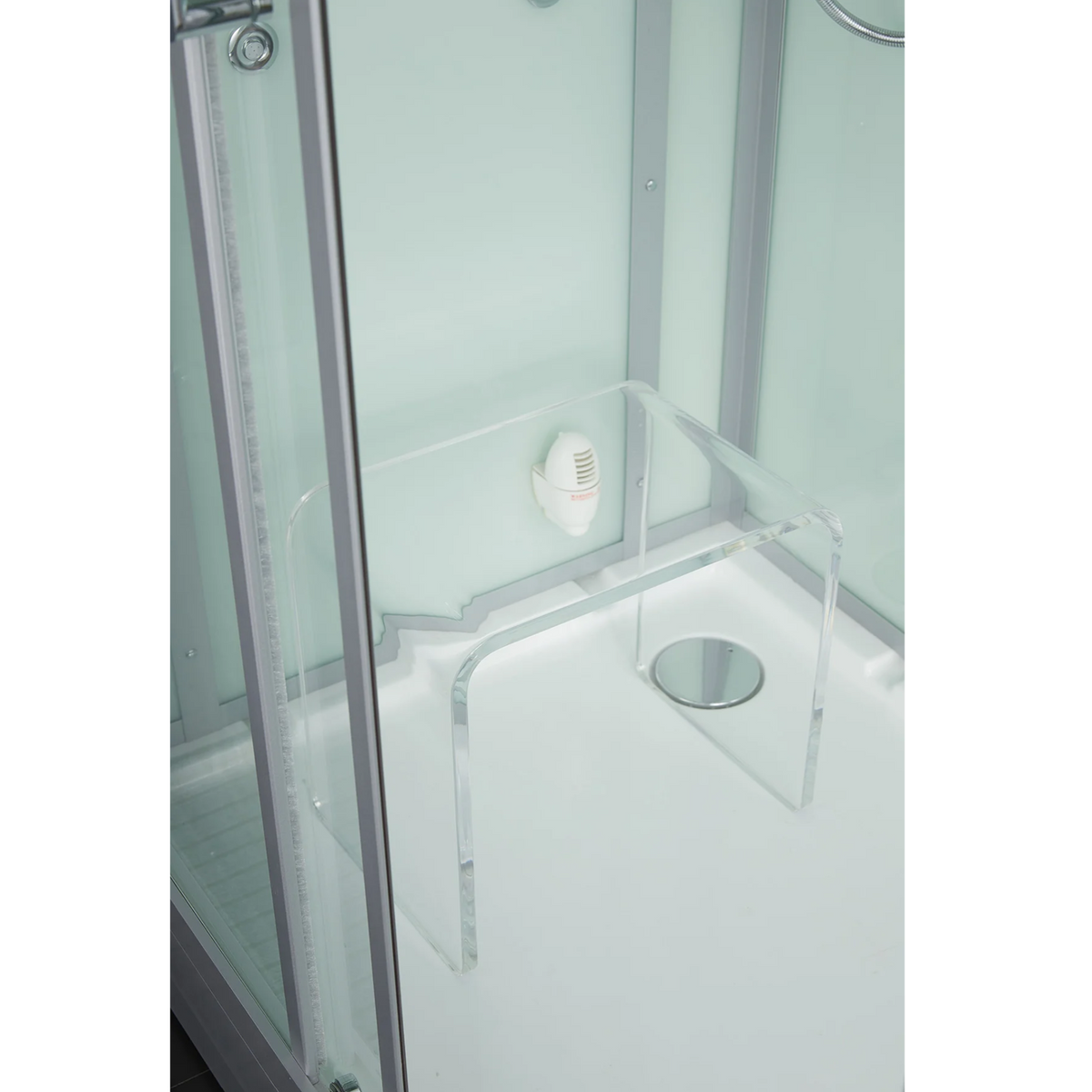 Close-up view of the seat included with the Maya Bath Platinum Lucca Steam Shower white version.