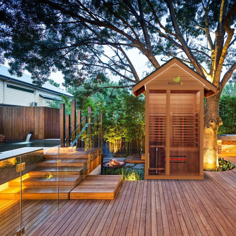 Medical Sauna Nature 5 Infrared Outdoor Sauna 2 People in an outdoor setting.