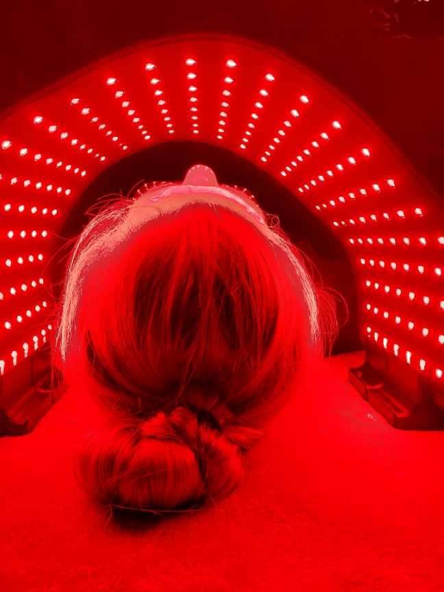 Intensive red light therapy treatment with ORB Facial Light &amp; Therapy Wrap for anti-aging and skin rejuvenation.