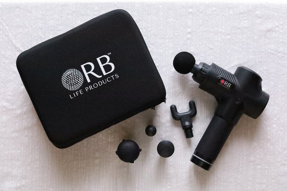 ORB Massage Gun alongside its durable case and interchangeable heads for various massage options.