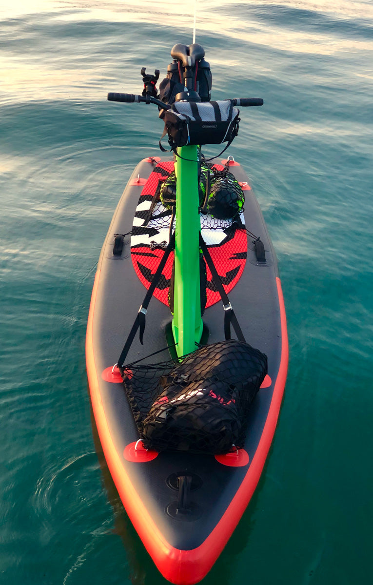 Overhead view of the Red Shark Adventure Bike Surf on calm waters at dusk.