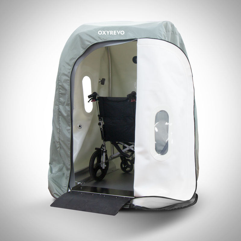 Open OxyRevo Wheelchair Heal 40 1.4 ATA Hyperbaric Chamber showing a wheelchair inside.