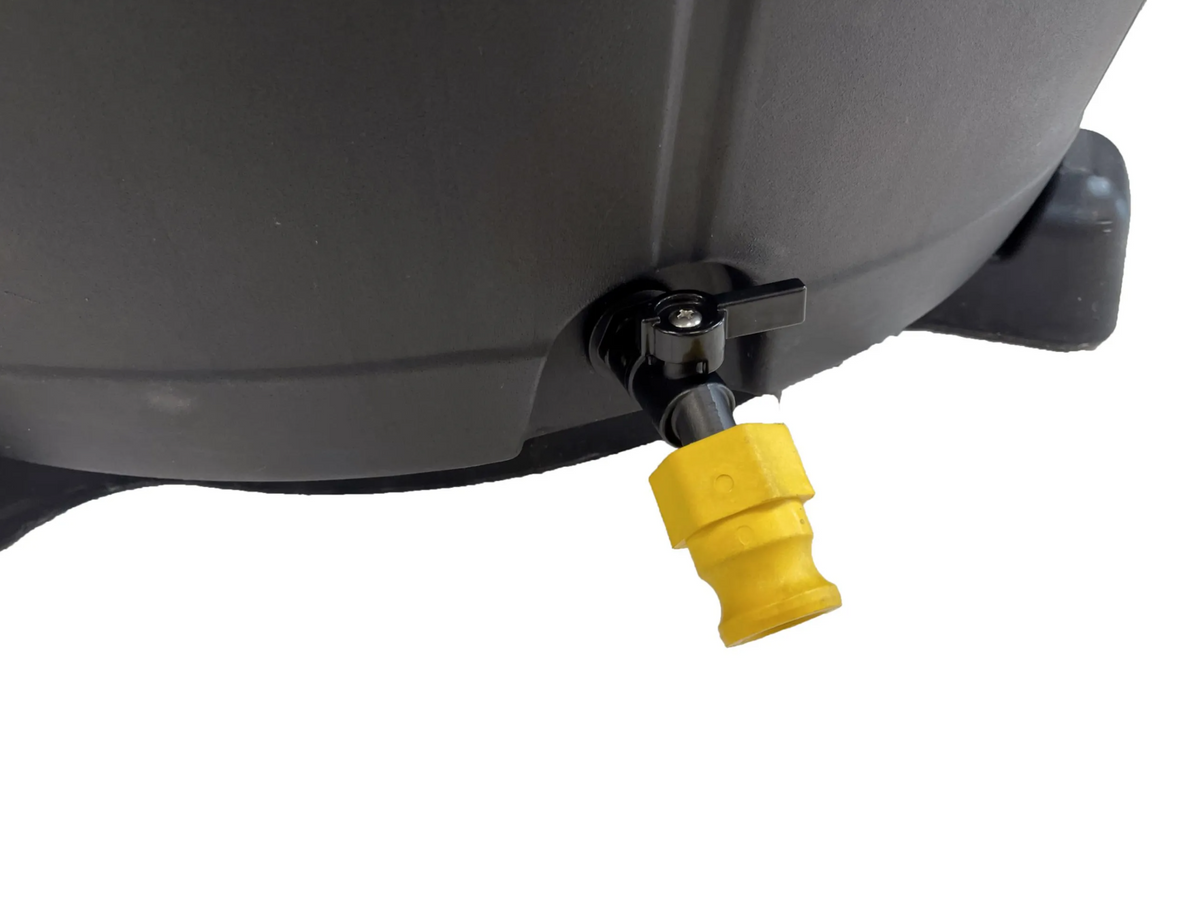 Close-up view of the yellow drain spigot on a Penguin Chillers Barrel Cold Therapy Chiller unit.