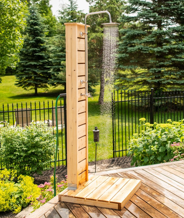 Side view of Leisurecraft Canadian Timber Sierra Outdoor Shower in an outdoor setting.