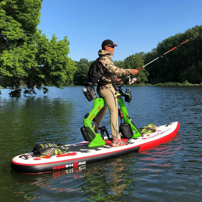 Angler using Red Shark Adventure Bike Surf for fishing on a sunny day.