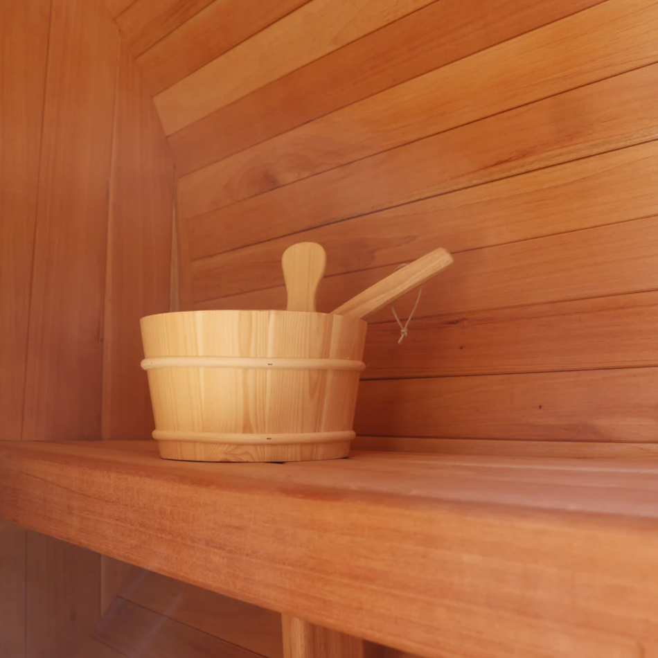 Sauna bucket included with Scandia Barrel Sauna with Canopy.